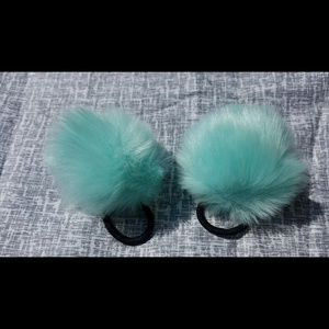 Pair of turquoise blue puff ball hair bands